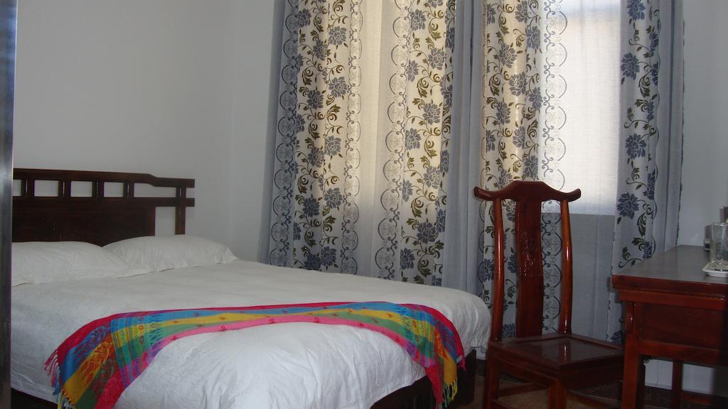 Faier Harbour Inn Dali  Quarto foto