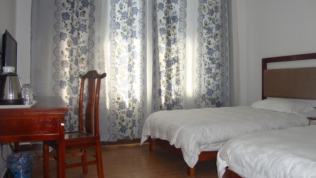 Faier Harbour Inn Dali  Quarto foto