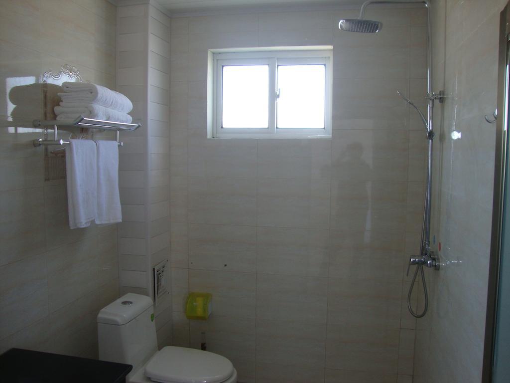 Faier Harbour Inn Dali  Quarto foto